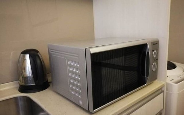 Pearl Suites Swiss Garden Residences