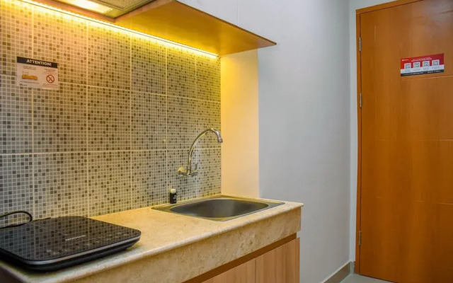 Nice And Cozy Studio At Evenciio Apartment