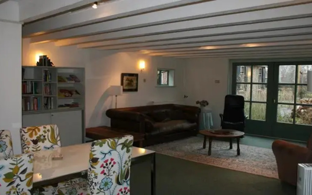 Holiday home Koetshuis de Polderruimte