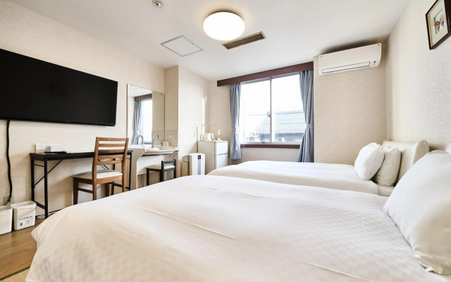 Okasan Hotel