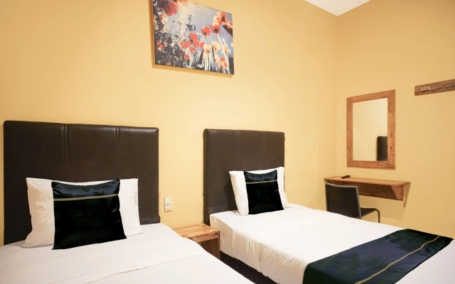 Hotel O near Plaza Millenium formerly Kapten Muslim Residence – Guest Rooms – Medan