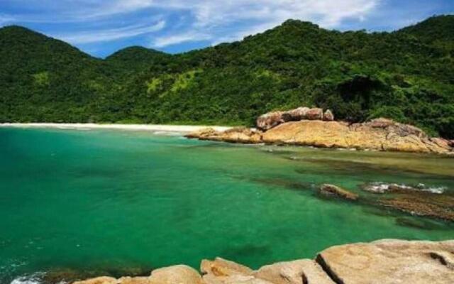 Suíte com cozinha próxima a Trindade Paraty Flats Roots