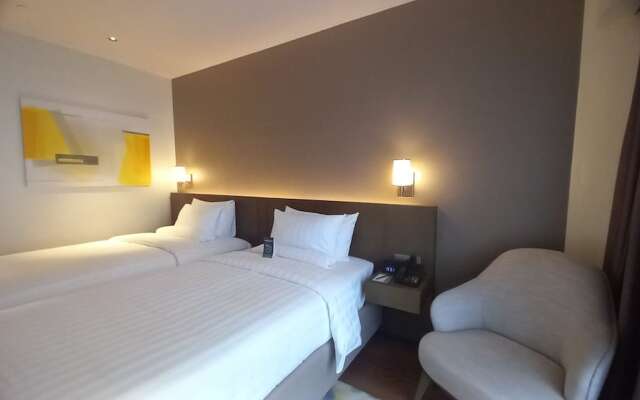 Capital O 950 Acqua Novotel Tower