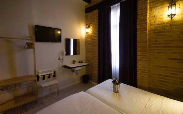 Suites Boutique Jardines del Montornés