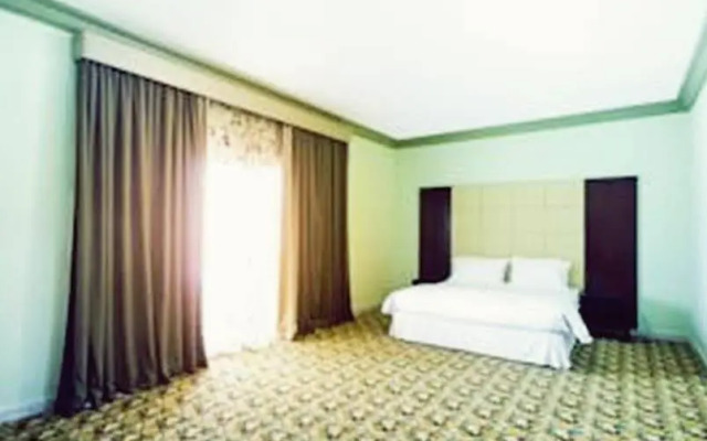 Rose Garden Hotel Suites