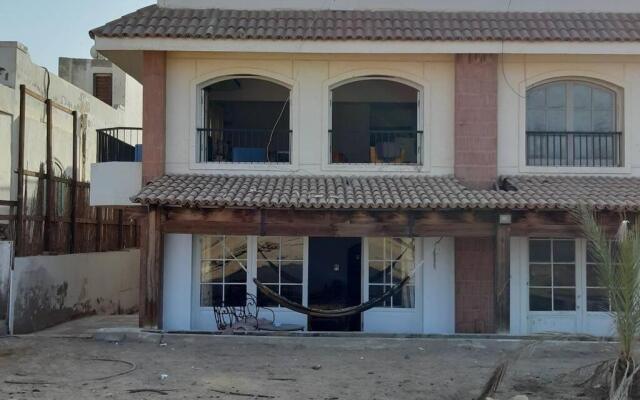 Beach apartment in front of the sea