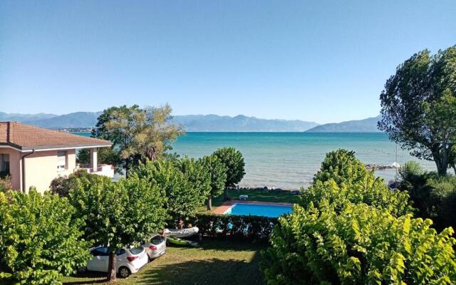 Casa Lugana 8 - monolocale con piscina fronte lago