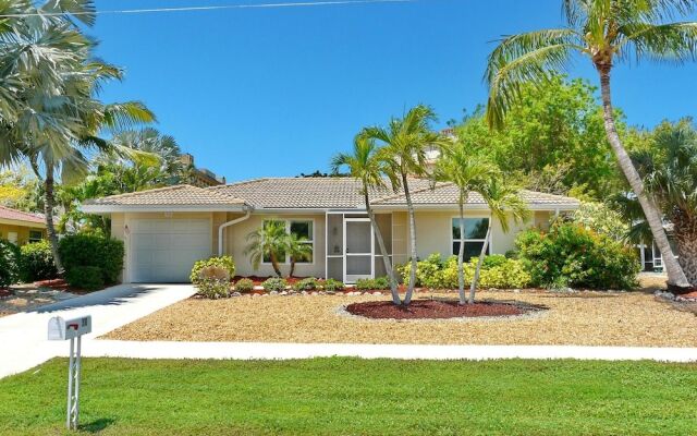 Cozy Home With Sunroom, Pool and Steps to Beach