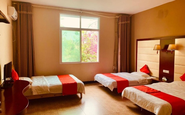 XiShuangBanNa International Aerial Garden South of Mekong River Business Hotel 傣江南商务酒店 – Guest Rooms – Xishuangbanna