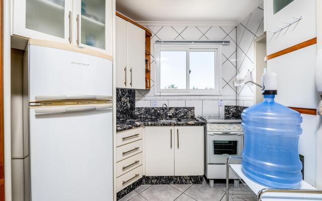 Apto c/churrasq a 10min da praia de Jurerê RFL203