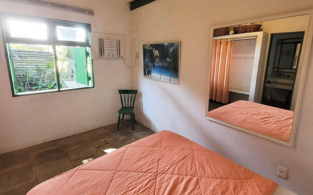 Linda casa com piscina a poucos passos da praia