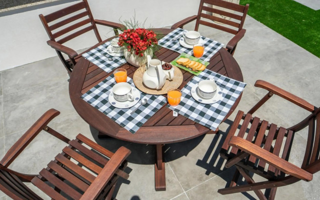 Villa con piscina a pie de playa