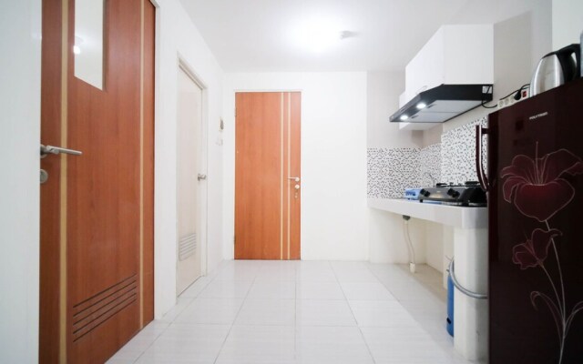Cozy Living And Tidy 2Br At Puncak Dharmahusada Apartment