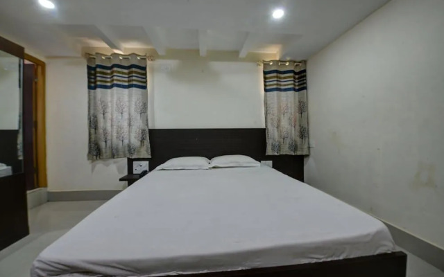 SPOT ON 37153 Karavali Paradise