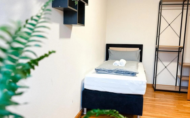 Suiteable Living - Boardinghaus mit Parkplätzen, WLAN und Waschraum