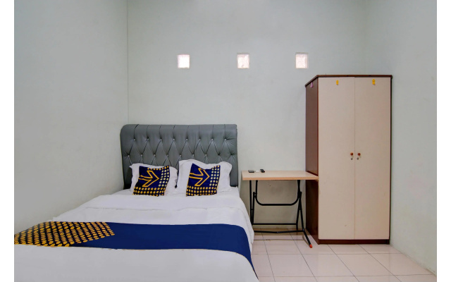 Hotel O Awi Stay Syariah Near SIMPANG KAWASAN INDUSTRI WILMAR PELINTUNG – Guest Rooms – Pelintung
