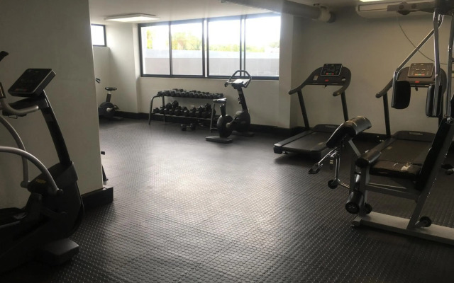 Highrise Windhoek apartment with skyline view, pool and gym