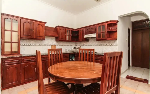 Oyo 115 Qi Mag Apartments