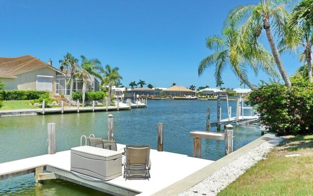 Relaxing Waterfront Home With Pool and Steps to Beach