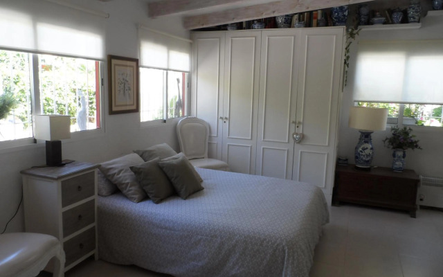 Casa con jardín frente Playa de Burriana