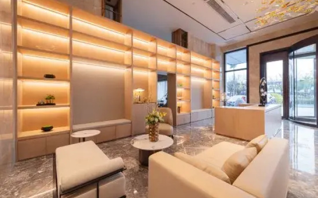 BaiLiQuanZhiJiuDian Hotel (Jiangmen Binjiang Sports Center)