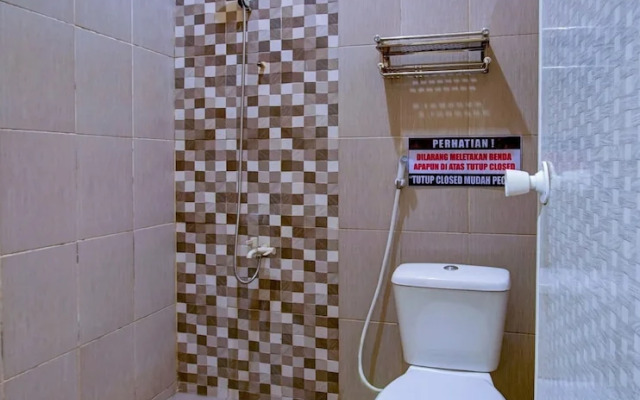 Melati House Syariah by OYO Rooms