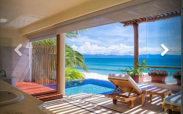 Exciting six Bedroom Oceanfront 75 Long Pool Villa
