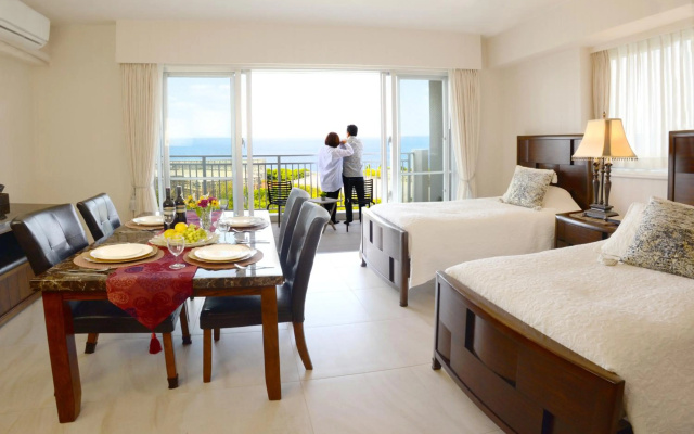 Wisteria Condominium Resort – Guest Rooms – Motobu
