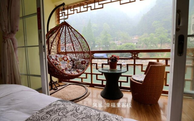 Fenghuang Happy Hotel