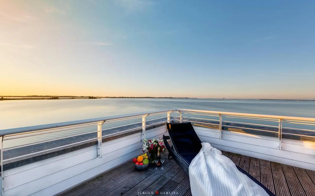 Ostseewind: Wasserblick, finnische Sauna, Whirlwanne, Kamin, 2 Parkplaetze