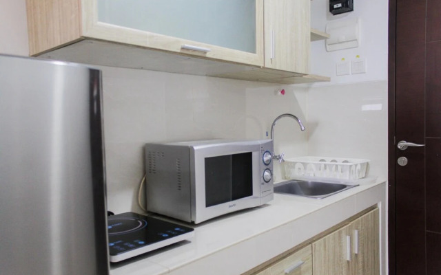 Bright Studio Apartment at Springwood Residence