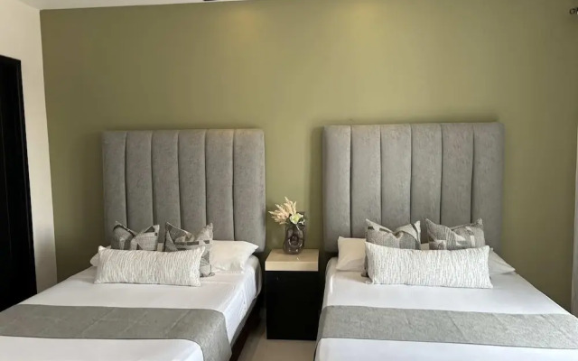 Apartments with Shared Pool and BBQ