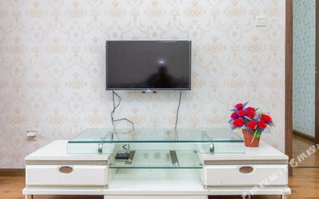 Qingqing Wojia Hotel Style Apartment