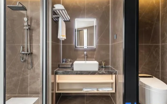 Kaistone International Hotel (Wanda Plaza Xupu Station) — 3-star hotel in Huaihua