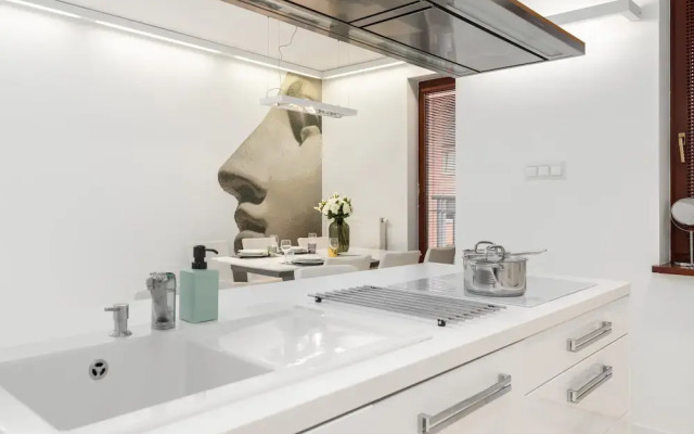 Minimalist Apartment Poznan by Renteres