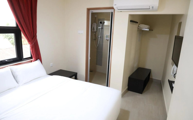 Capital O 90897 Island City Hotel