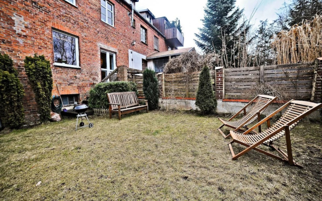 Secret Garden by Grand Apartments