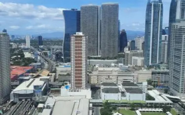 Cozy 1BR with balcony at Fame Residences