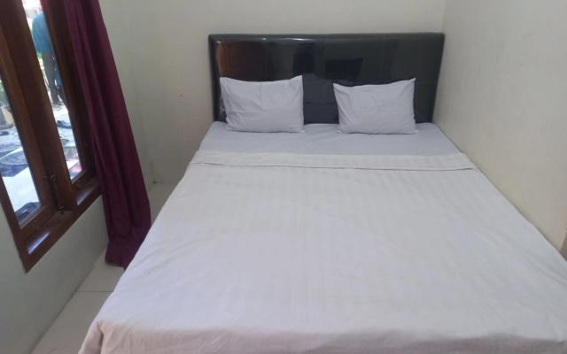 Hotel O Chimi Rumah Kost – Guest Rooms – Purwokerto