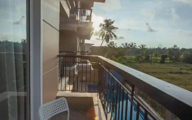 Palm Retreat 1BHK Pool & Field Views