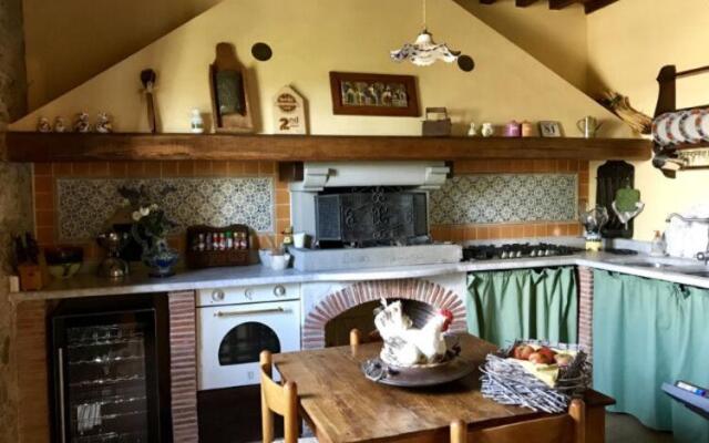 A nice rural house surrounded by hills and fields