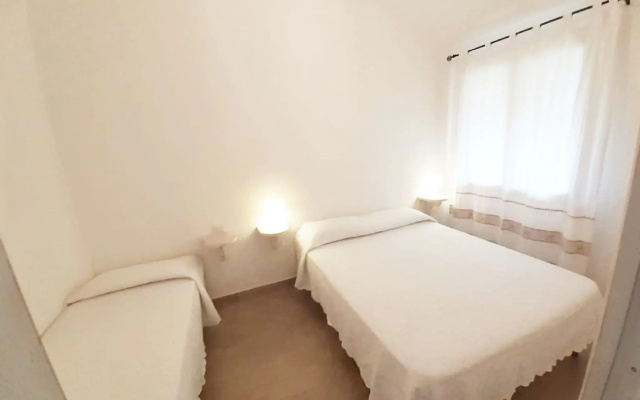 Charming Holiday Home in Marinella With Shared Garden