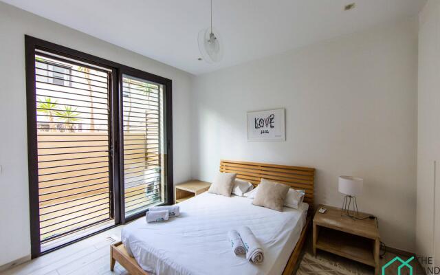 LUXUEUX APT AVEC JARDIN ET GARAGE PRIVéS @ MARSA