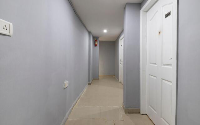 OYO 49228 Gold Inn Grey