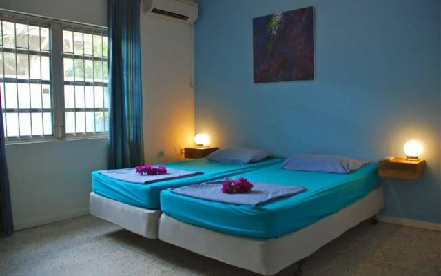 Caribbean Flower Apartments