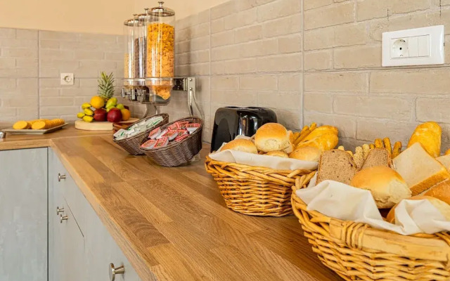 Theos village apartments