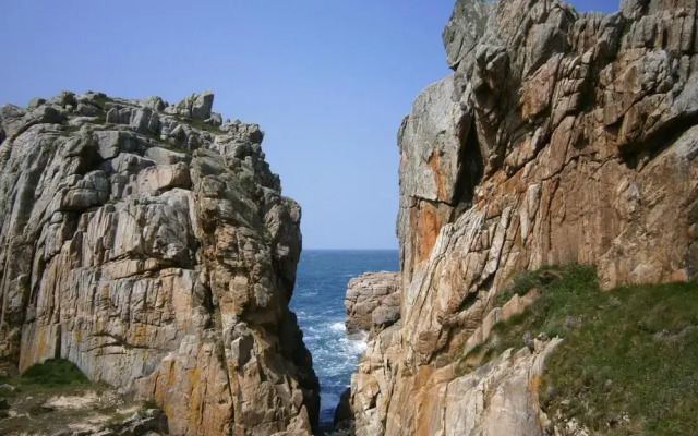 Stone House by Les Godelins Beach