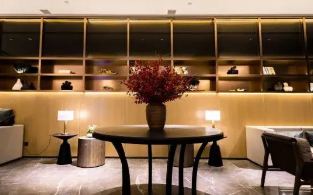 Maison New Century Hotel Lu'an