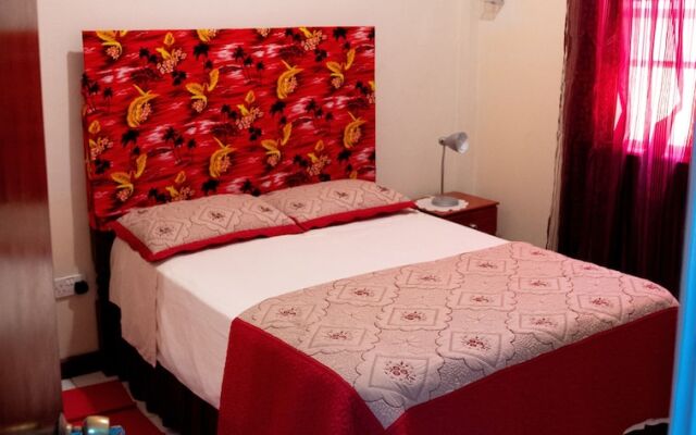 Tropical Breeze Guesthouse and Furnished Apartments