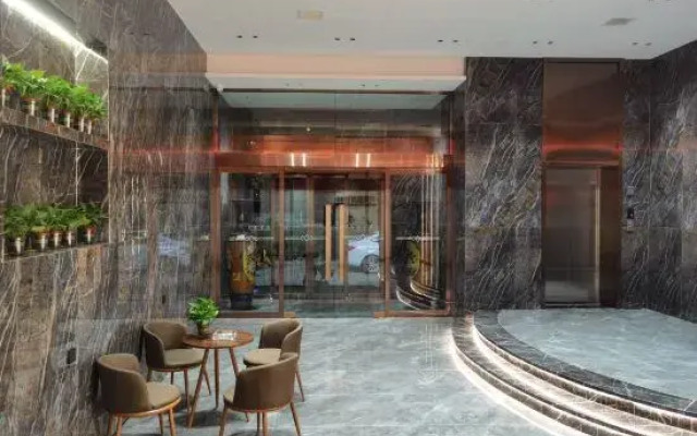 Wanrong Aijia Business Hotel